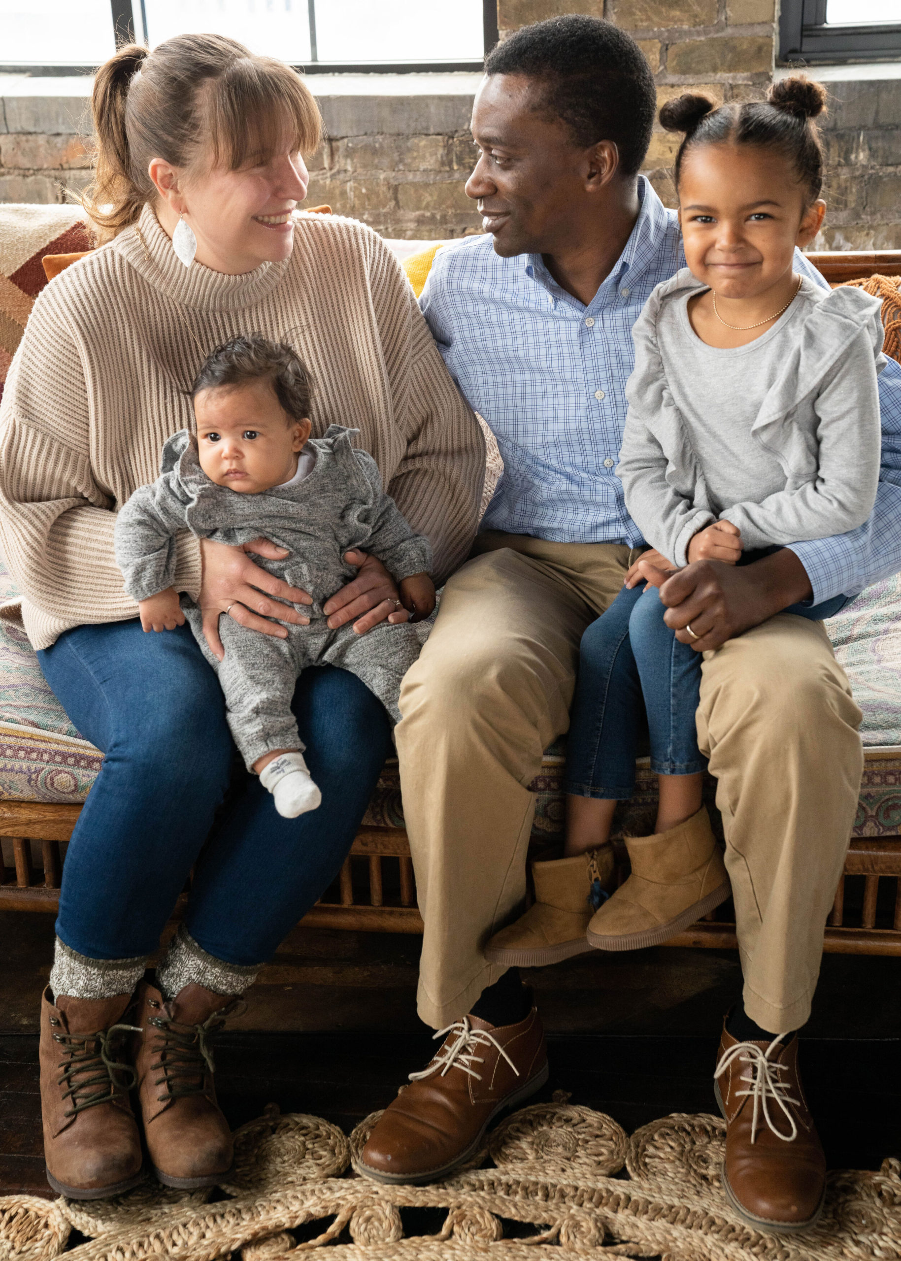 Mom and Dad looking at each other - family session