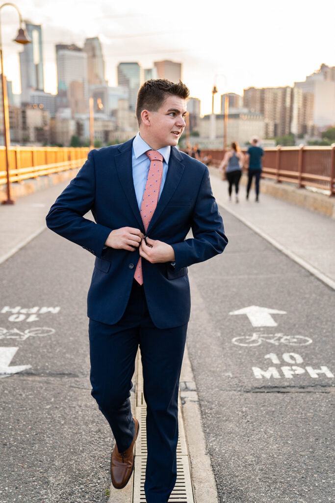 Guy wearing a dressy outfit for his senior pictures.
