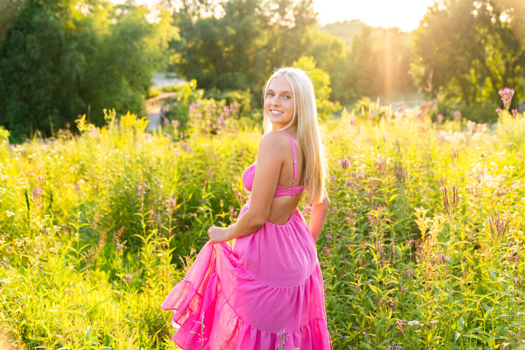 Senior pictures in a field