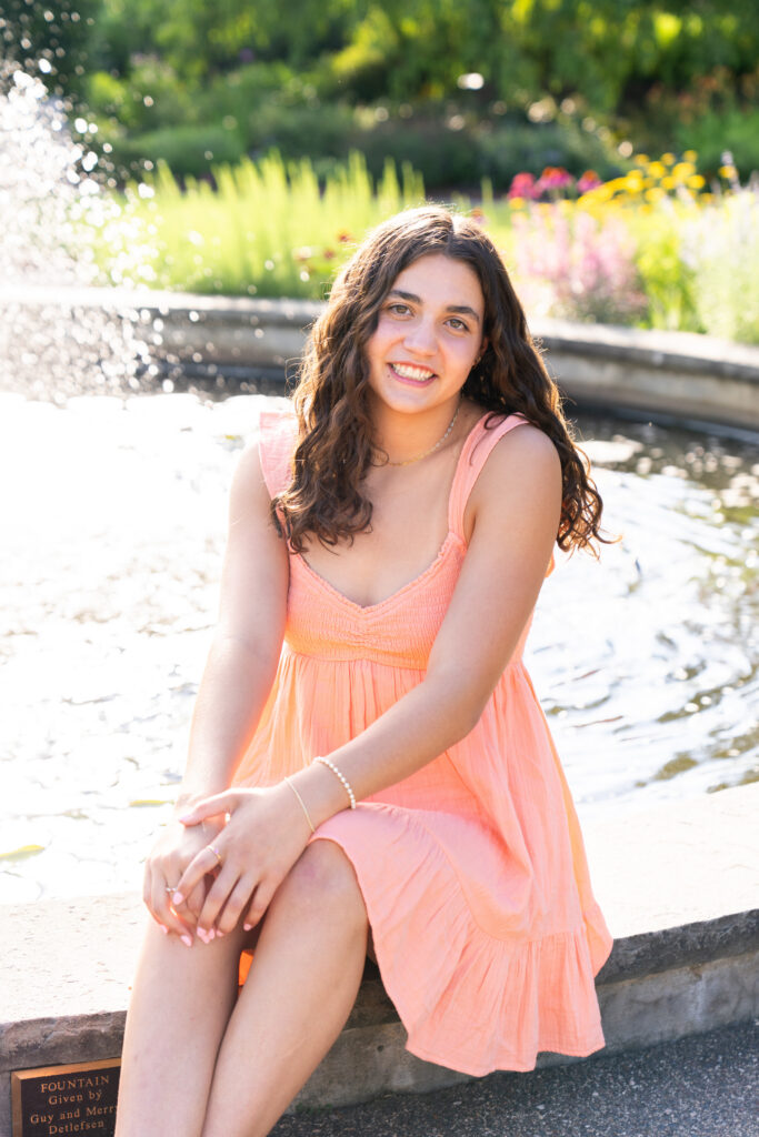 Kristen Elizabeth Photography takes senior photos of a Rosemount High School senior at the Minnesota Landscape Arboretum