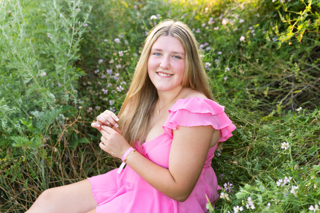 senior photos in a field
